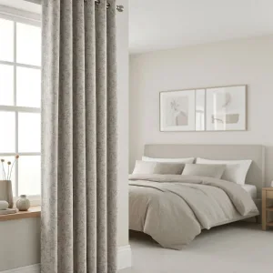 Beige & Taupe Leaf eyelet curtain in beige & taupe, styled in a room