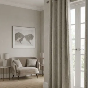 Beige Tonal Leaf eyelet curtain in beige, styled in a room