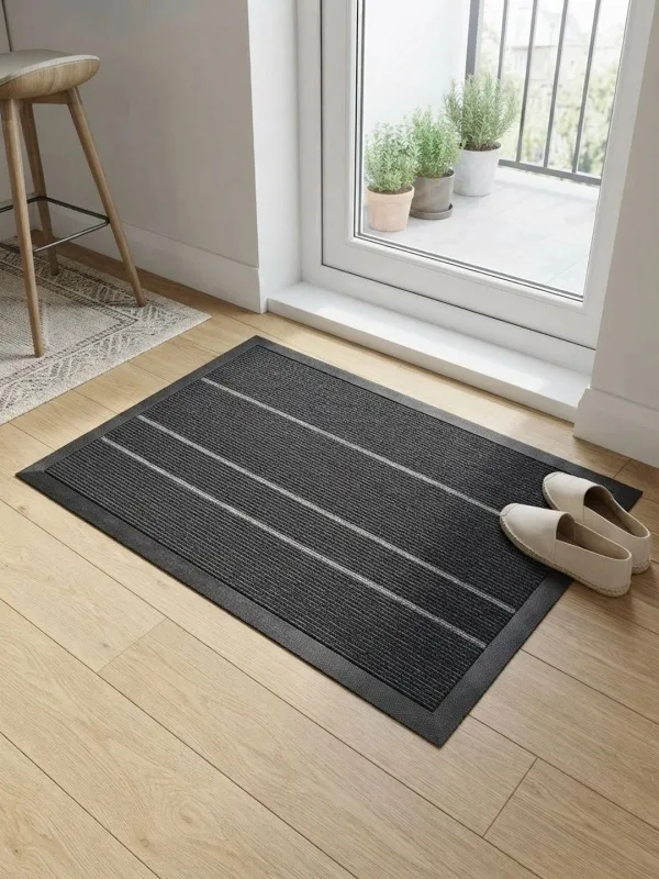 Charcoal Pinstripe Rubber-Border Doormat 75 x 45 cm in charcoal & ivory, styled at the entrance