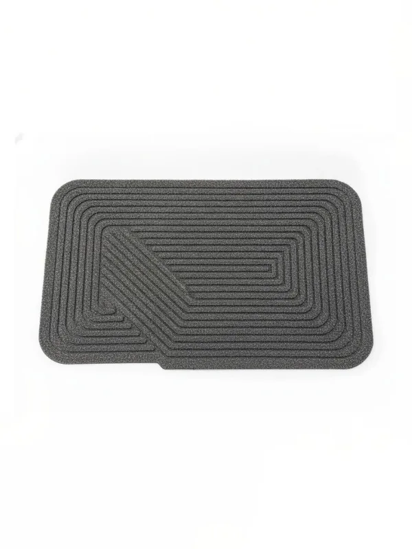 Charcoal Ribbed Anti-Skid Doormat in charcoal grey, styled at the entrance