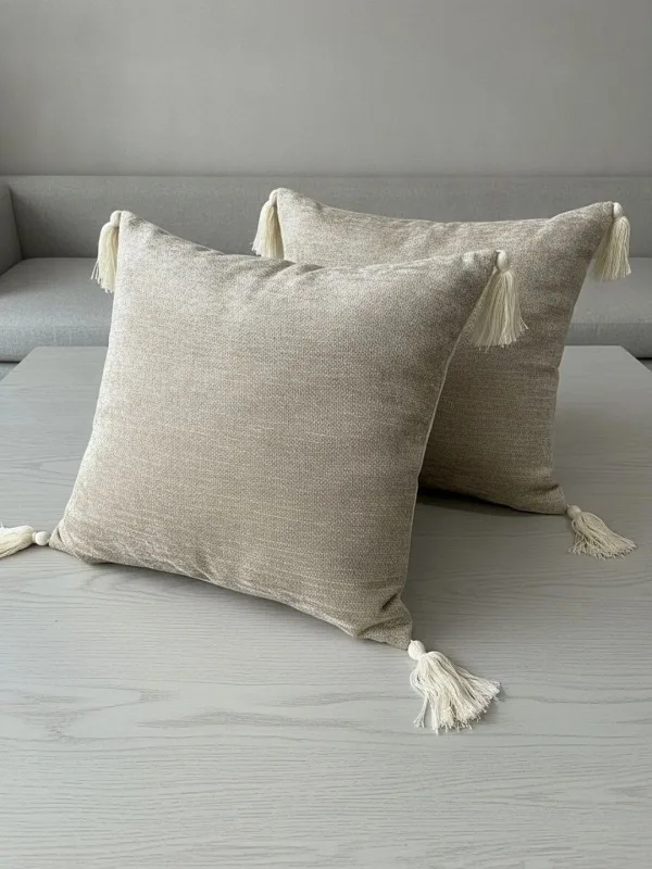 Oatmeal Beige Textured Tasselled cushion covers, set of 2, 16 x 16 inch, styled on a sofa