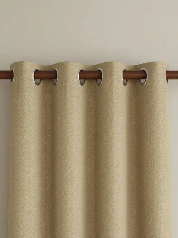 Sand Beige Herringbone room-darkening curtains in sand beige, styled in a room