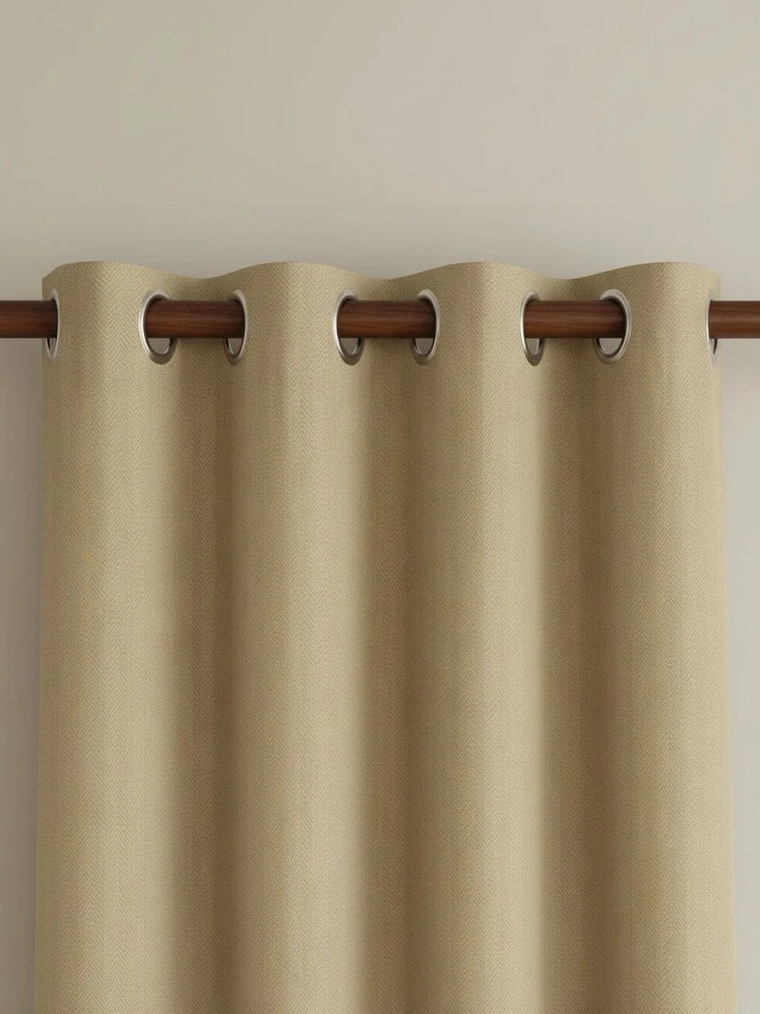 Sand Beige Herringbone room-darkening curtains in sand beige, styled in a room